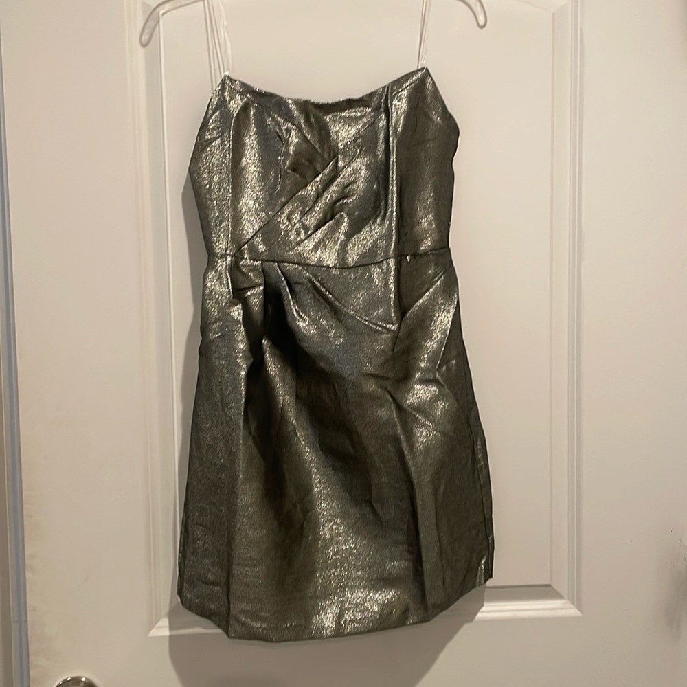 Silver strapless dress size large. Red Dress boutique order never worn.